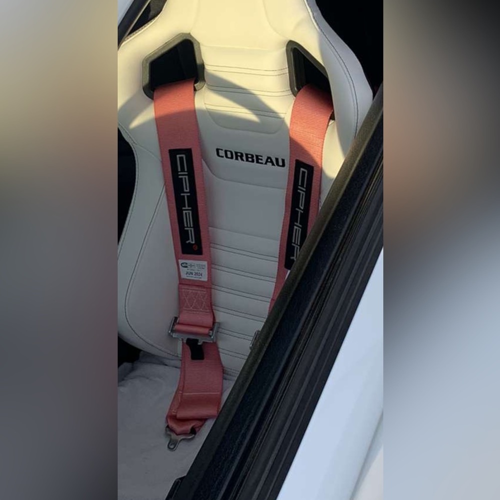 Pink CIPHER 5 start racing harness belt.
